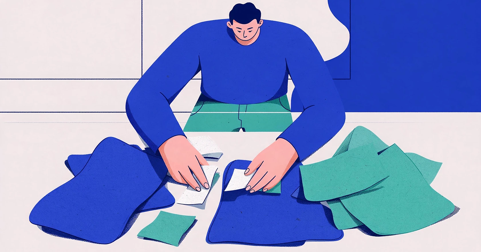 A person sorting abstract paper shapes, representing content, on a surface.