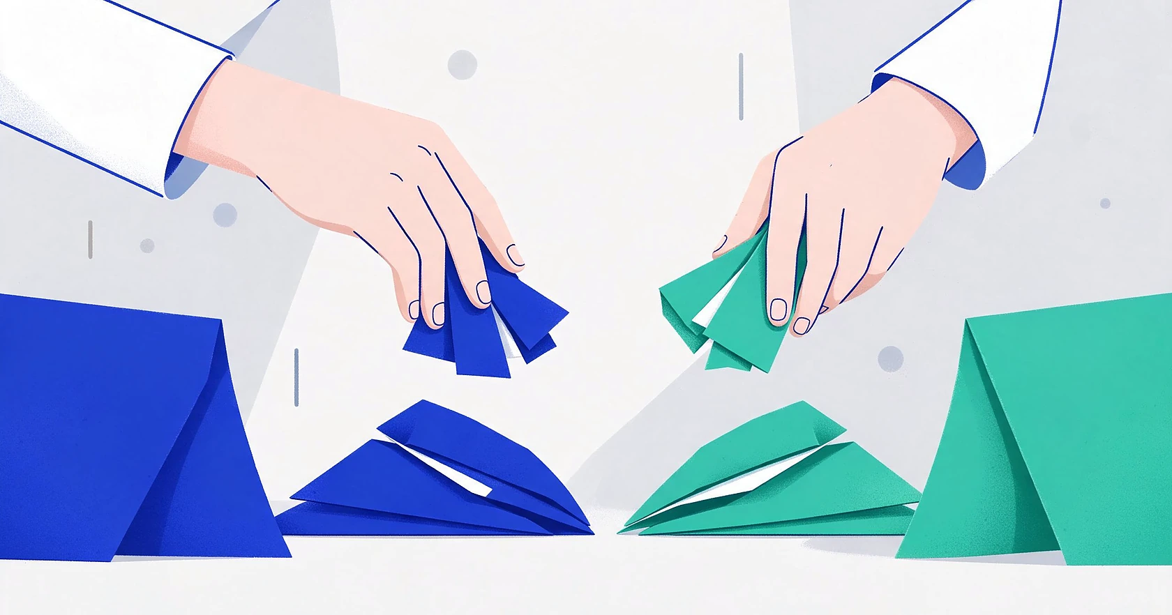 Hands separating soft, paper-like shapes into distinct piles.